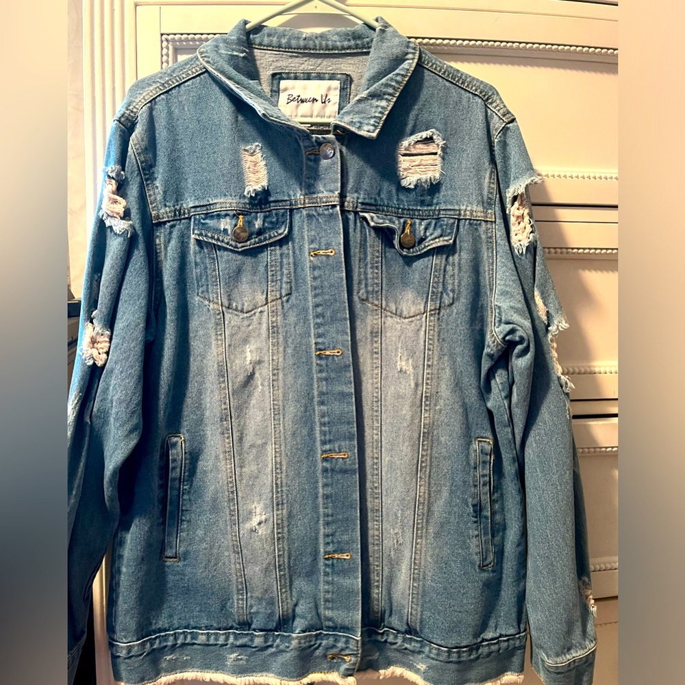 Ripped jean jacket